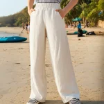 Ademende broek met hoge taille en wijde pijpen